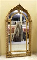 Grand Baroque Gilt Framed Beveled Mirror.