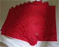 10 red placemats, Machine washable. 52% Cotton and