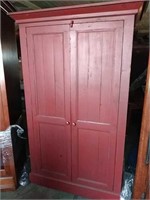 Colonial red armoire or entertainment center