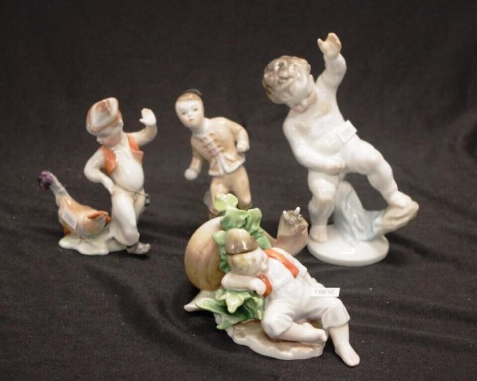 Three various Herend boy porcelain figures