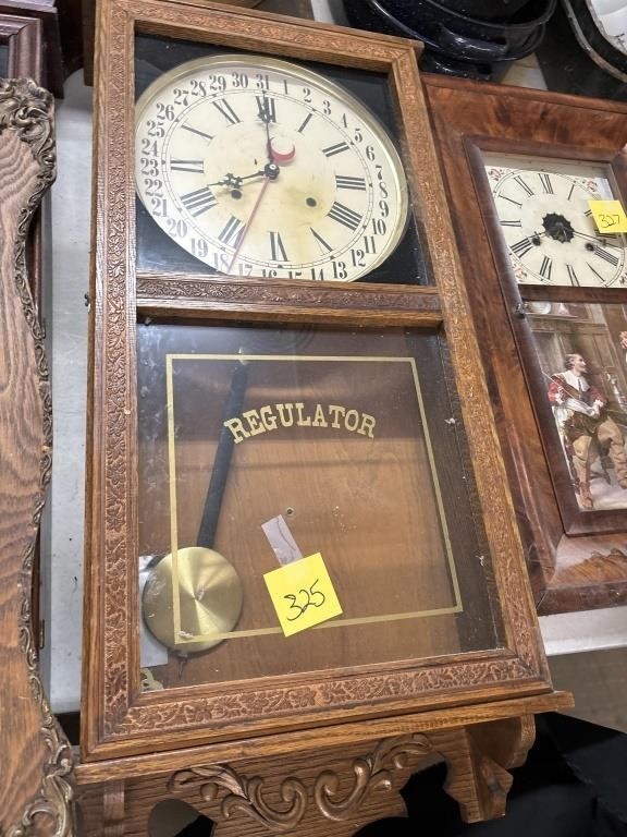 regulator clock with pendulum and key