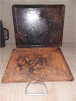 Two metal trays