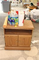TV Stand with Cleaning Items and Shop Rags