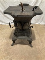 W D Sager #8 cast iron wood stove, w/ sad irons,