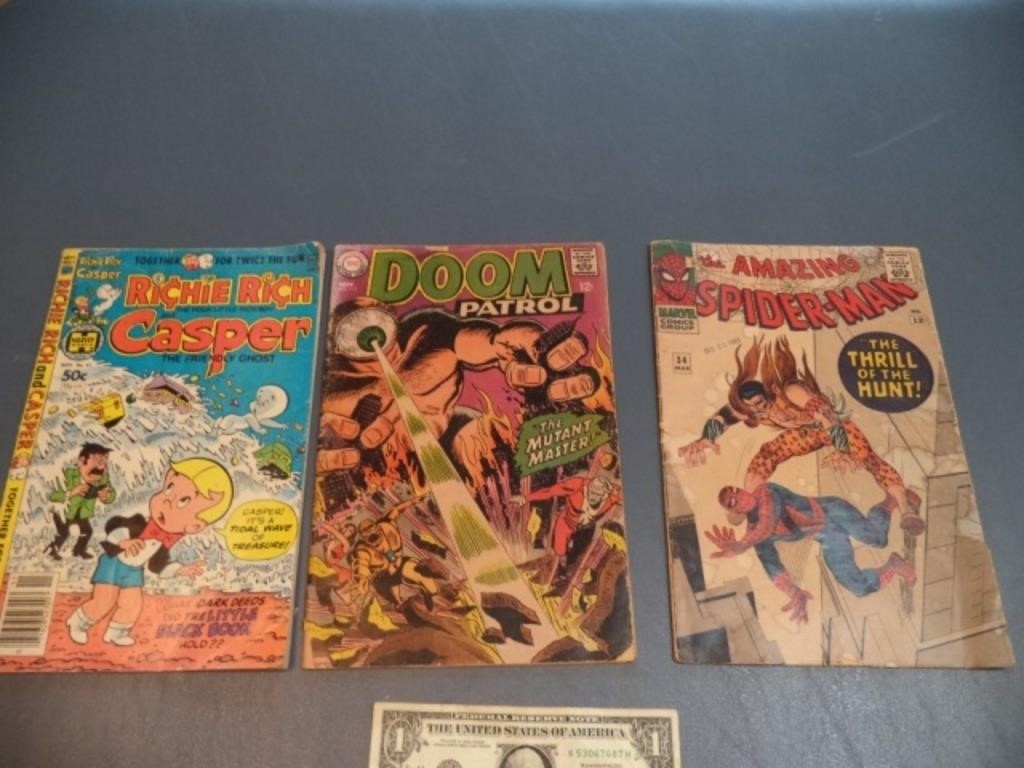 Three vintage comic books. Spiderman "Thrill of