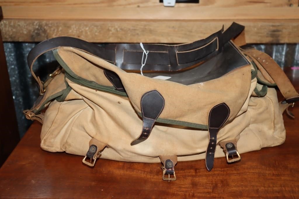 Orvis fishing tackle bag containing fly fishing