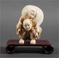 Japanese Carved Ivory Man w/ Daruma Figure