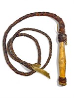 Vintage braided leather bullwhip with wood handle