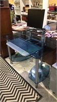 Modern computer desk with pull out shelf for