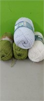 (4) Spools of yarn