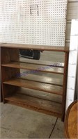 Wooden book shelf with mirror back