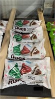 Four bags of in date, white cream, Hershey kisses