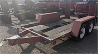 No title  2 axle Skid Loader Trailer 6'x11'.  No