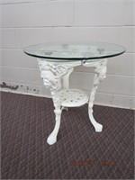 Cast iron base table glass top 24 X 26"H