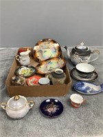 Asian Teapot, Saucers and More