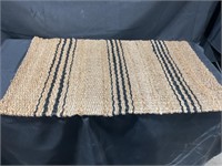 Woven floor mat