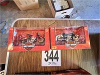 2 Harley Davidson Motorcycles In Boxes