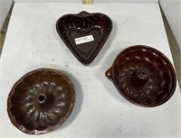 Three USA brownware molds