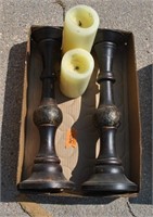 large candle holders and candles