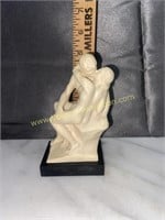 Carved lovers statue