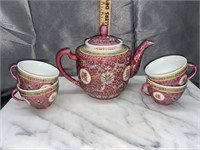 Pink teapot and 4 cups