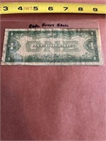 Rare “funny back” 1928B $1 bill.