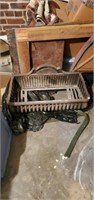 Vintage cast iron fireplace grate
**IN BASEMENT