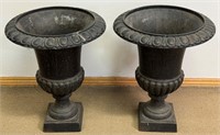 DESIRABLE PAIR OF HEAVY CAST FOOTED PLANTERS