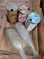 beer tin cans and bottles