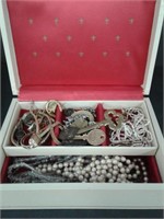 Vintage jewellery box with contents