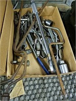 Collection of various wrenches and a torque