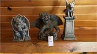 Three gargoyle statues