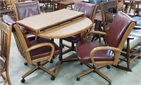 Table with 4-Leather Roller Chairs