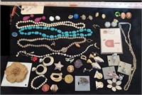 All on tray- jewelry earrings necklaces brooches
