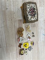 Vintage jewelry box with brooches