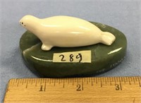 Carved ivory seal, 21/2", mounted on a soapstone b