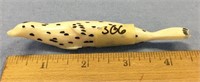 4 1/2" spotted seal ivory carving, scrimmed by Slw