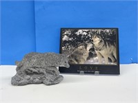wolf figure and inspirational image on board,
