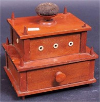 An early sewing box with bone pulls and pin