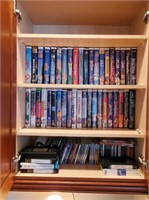 VHS and CDs with Disney-Contents of Cabinet