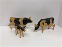 Set of three vintage plastic cows