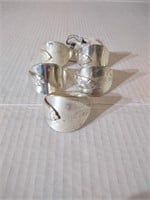 Set of 5 Two's Company silverplate napkin rings.