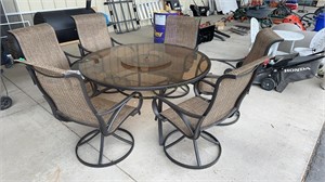 GLASS-TOP PATIO TABLE W/ 6 SWIVEL CHAIRS & LAZY