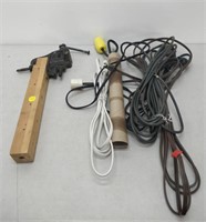 lot of extension cords and a clamp