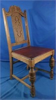 wooden chair with leather bottom