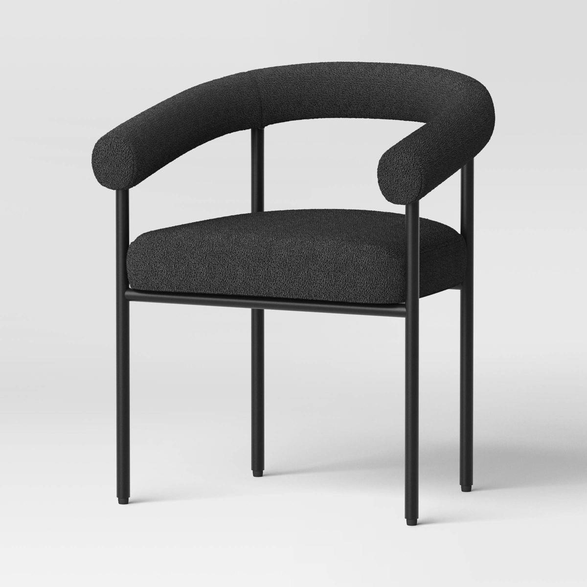 Black upholstered barrel dinning chair