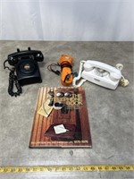 Assortment of vintage telephones and telephone