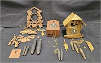 Group of vintage cuckoo clocks and misc. parts