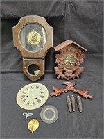 Group of vintage clocks with one cuckoo clock