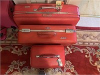 3 American Touristor Red Suitcase